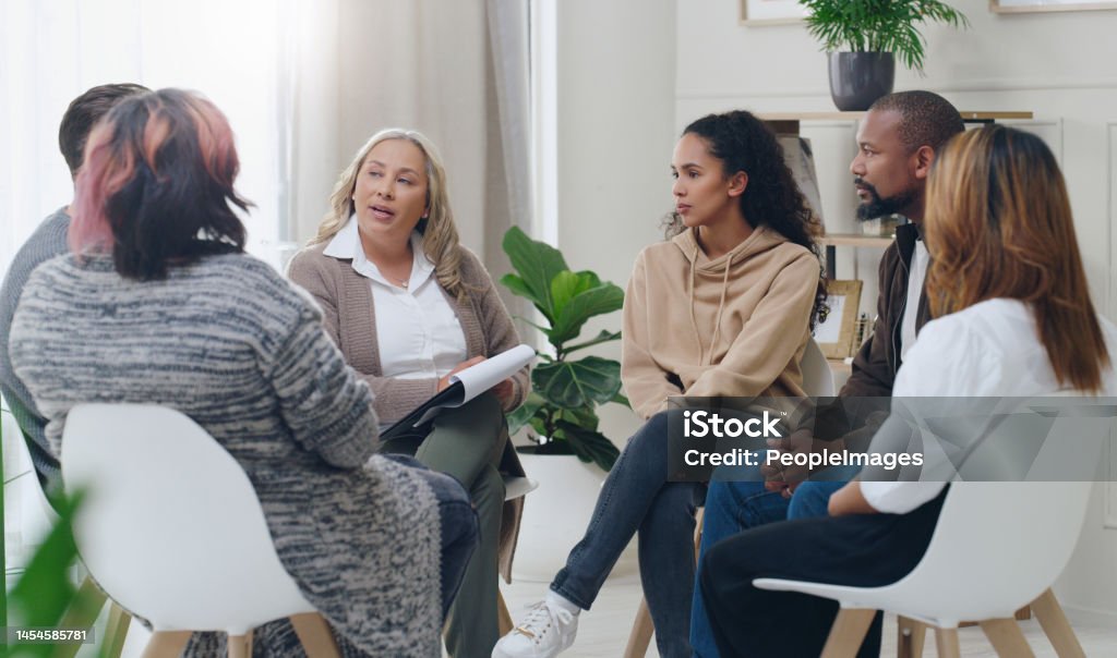 Clinicians in a counselling conversation